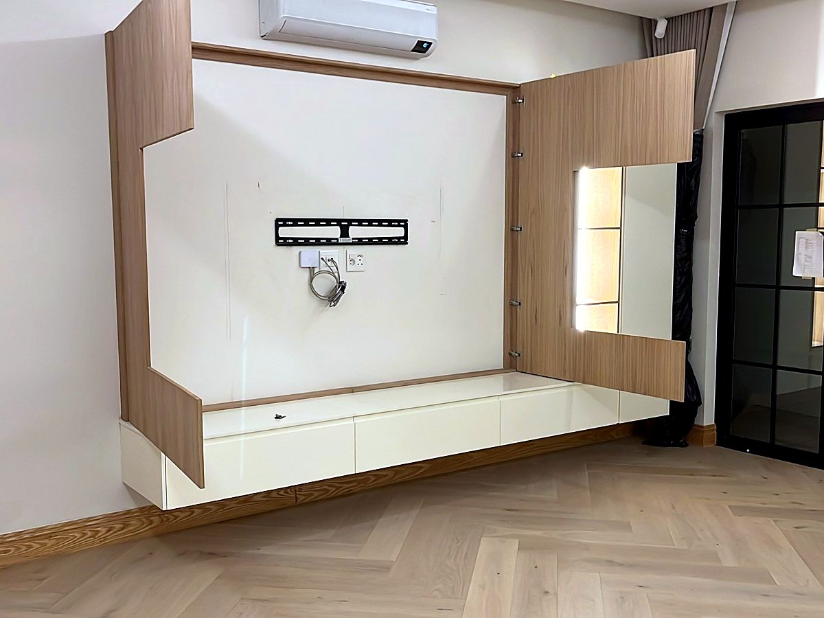 Modern living room TV wall with a TV bracket and a newly installed network data point